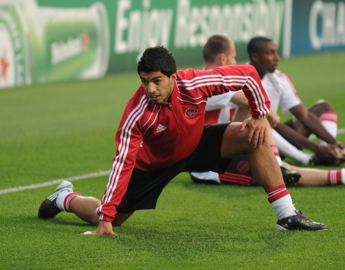 stretching before a football game